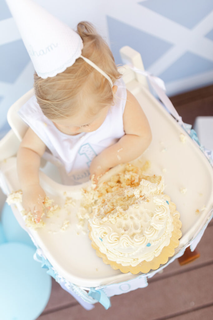 first birthday smash cake blue and white birthday party rodeo